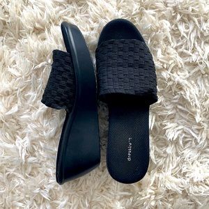 Black knitted heeled sandals